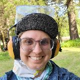Em